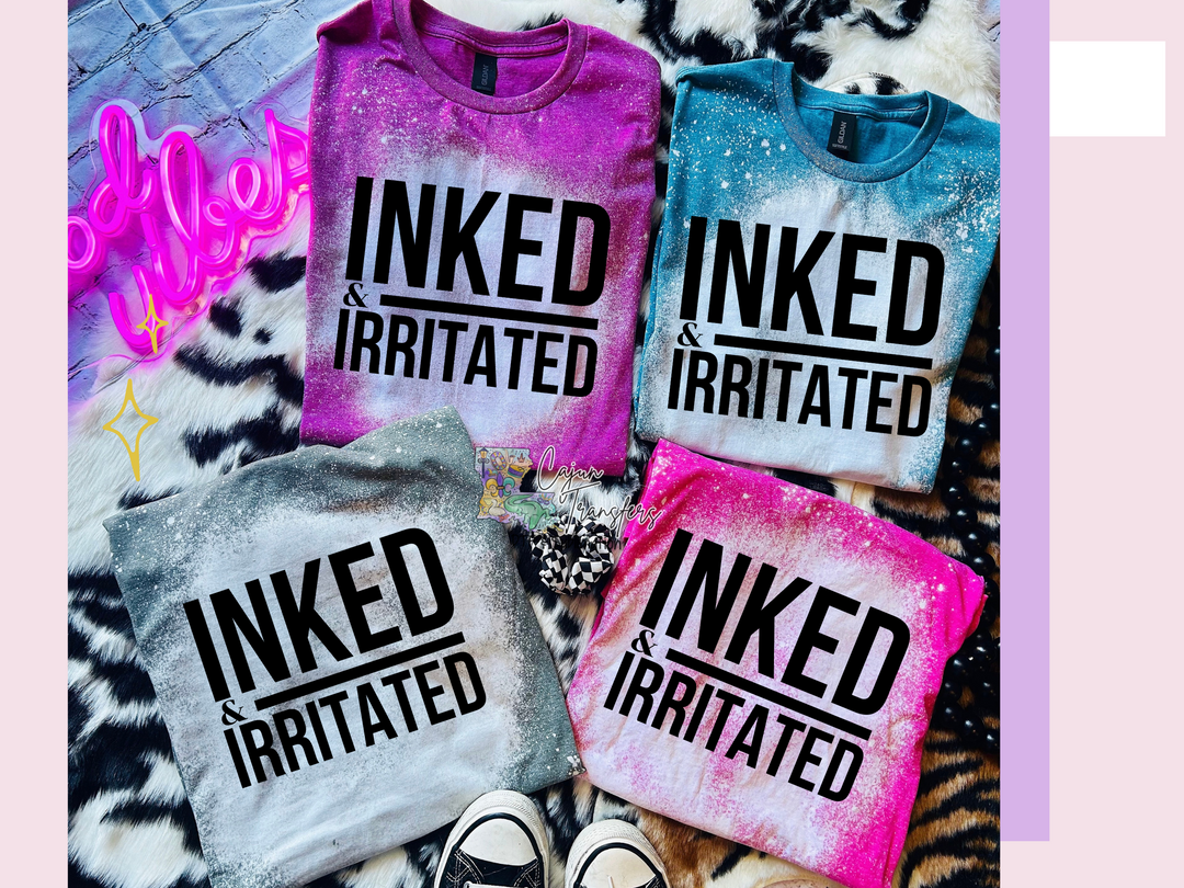three t - shirts that say inked and irritated