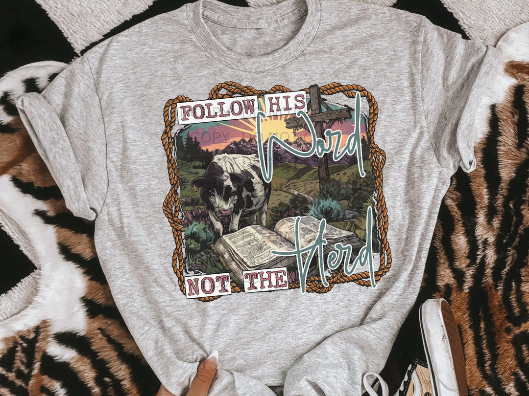 a t - shirt with a picture of a cow on it