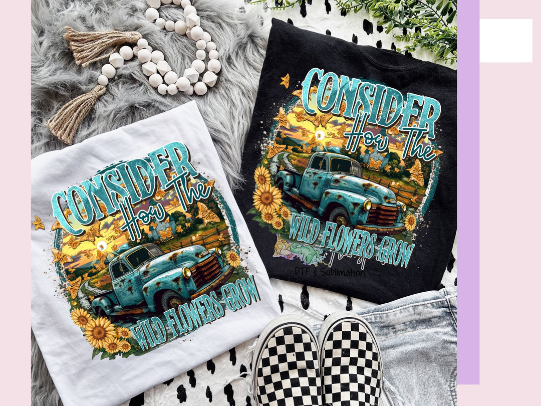 a couple of shirts that are on a blanket