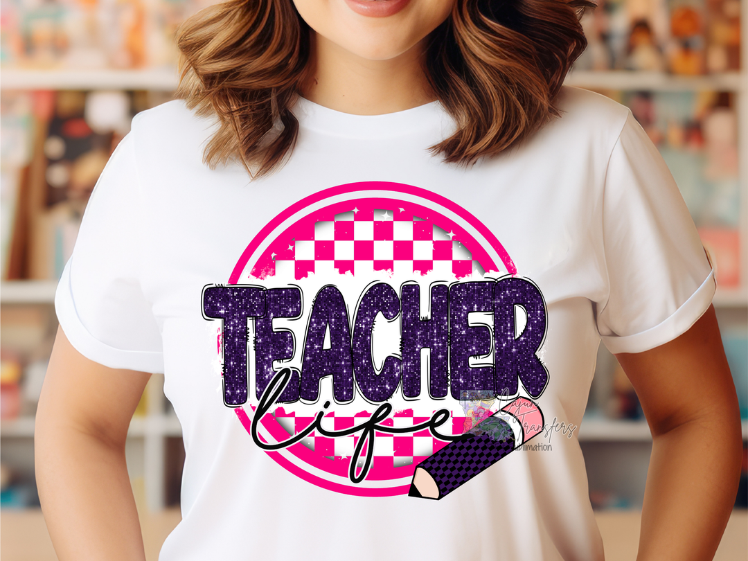 a woman wearing a t - shirt that says teacher life