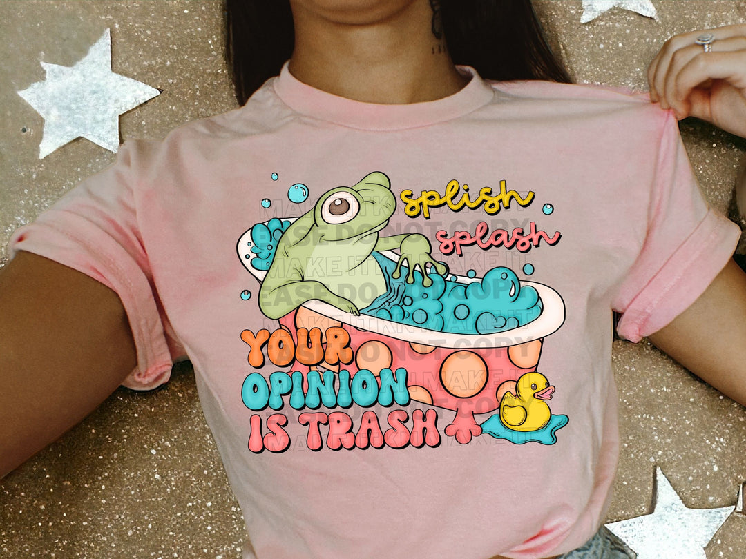 a woman wearing a pink shirt with a frog on it