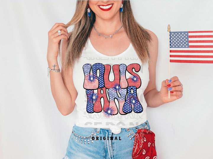 a woman holding a small american flag and a t - shirt