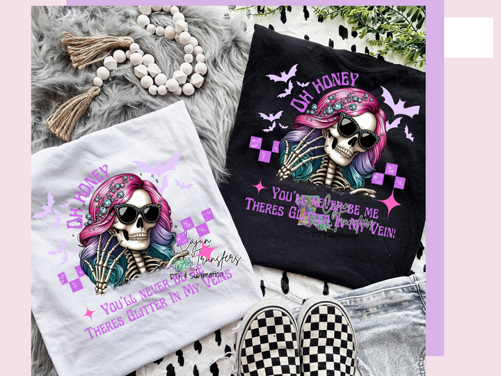 a couple of t - shirts sitting on top of a bed