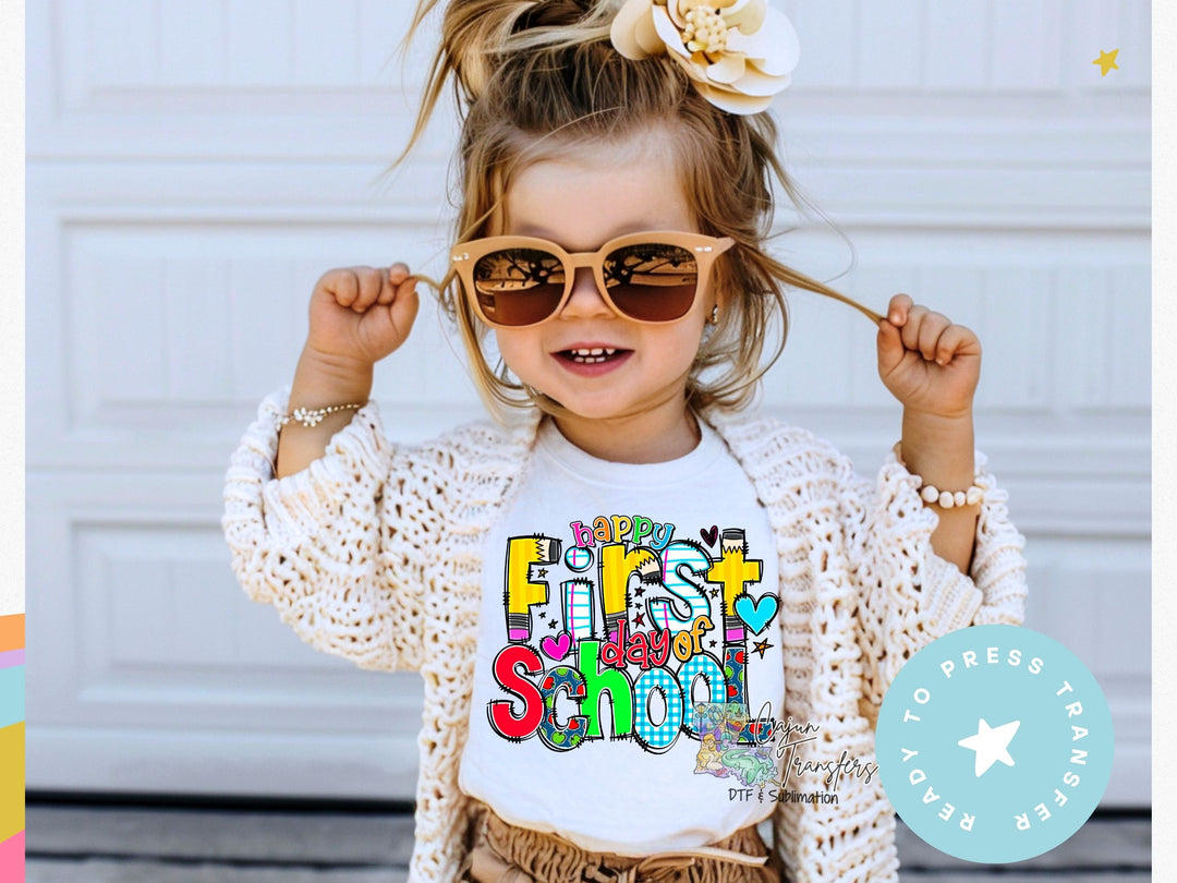 a little girl wearing sunglasses and a t - shirt