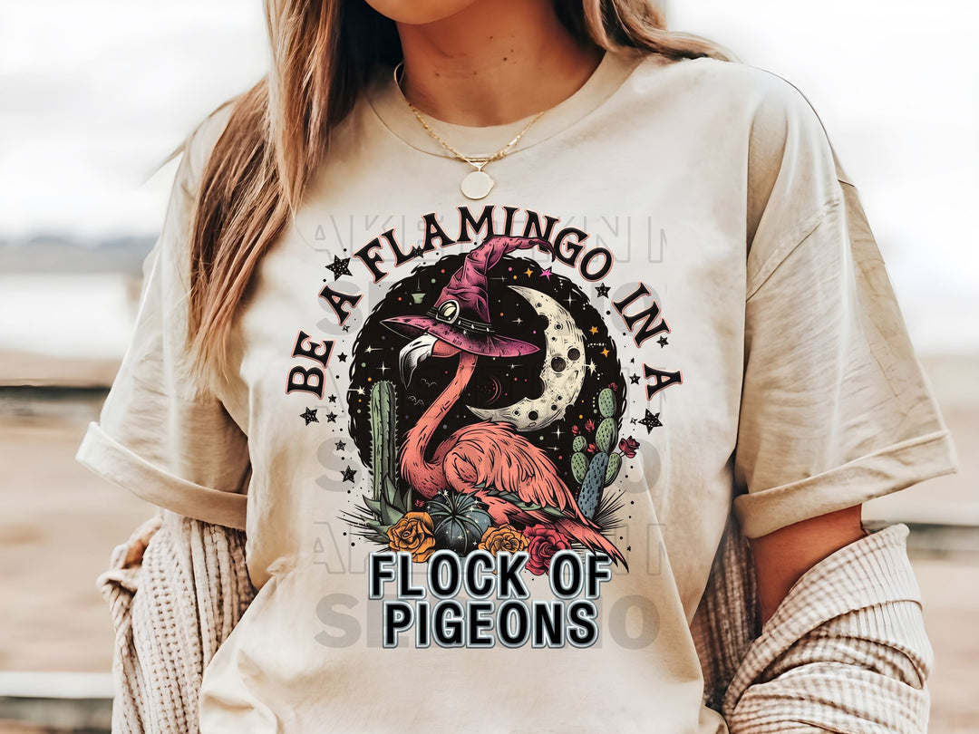 a woman wearing a t - shirt with a flamingo on it