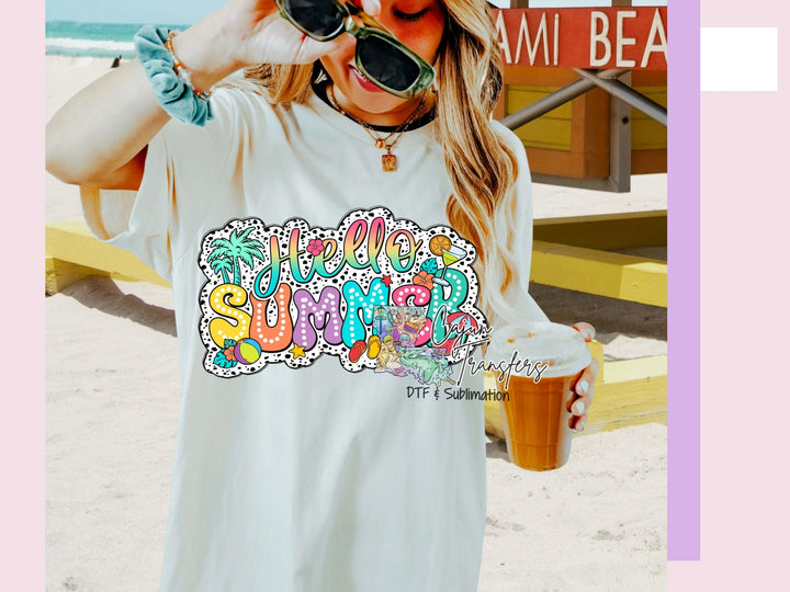 a woman in a white shirt and sunglasses on the beach