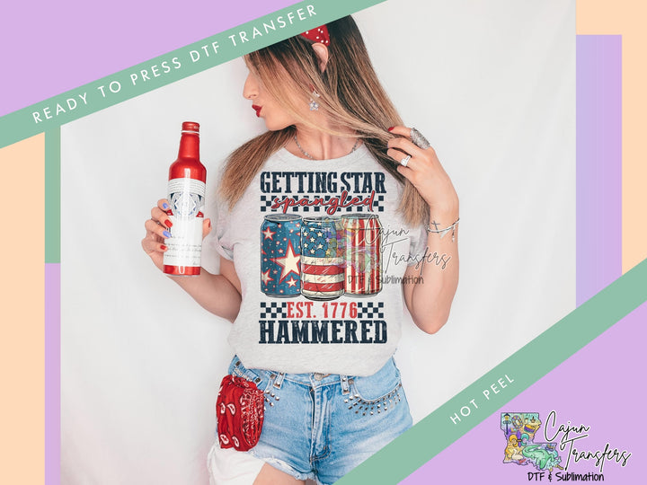 a woman wearing a t - shirt that says getting star hammered