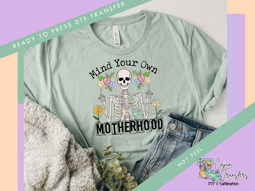 a t - shirt with a skeleton and flowers on it