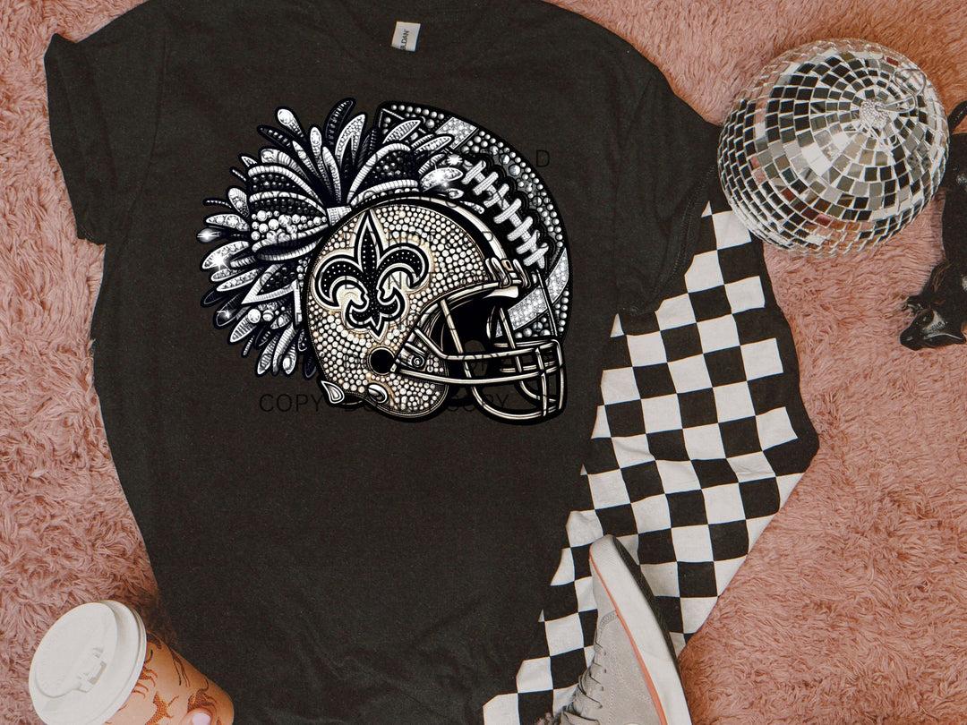 a black shirt with a football helmet on it