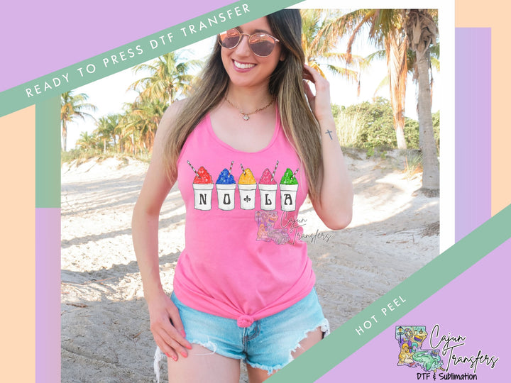 a woman wearing a pink shirt and shorts