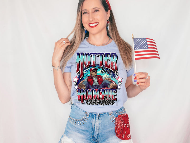 a woman holding a flag and a t - shirt