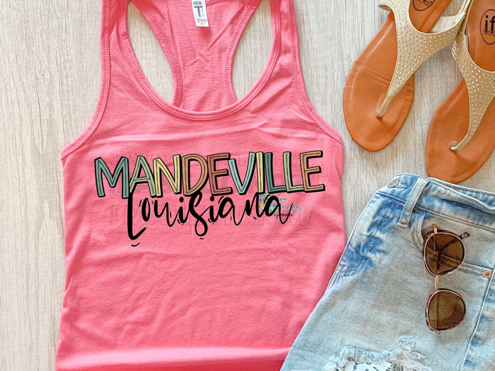 a pink tank top with a pair of shorts next to it