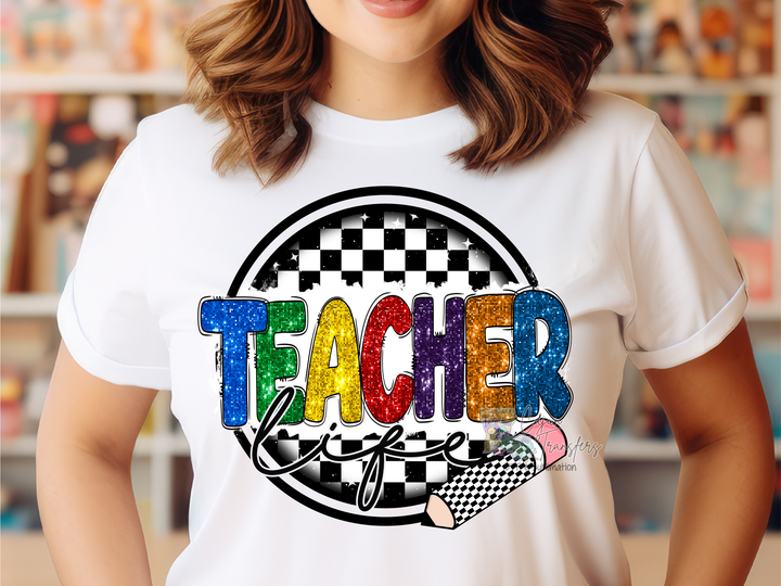 a woman wearing a teacher tshirt in a store