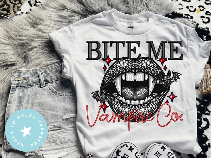 a t - shirt that says bite me vampire co on it