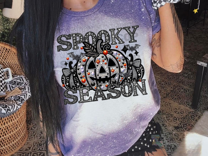 a woman with long black hair wearing a shirt that says smoky season