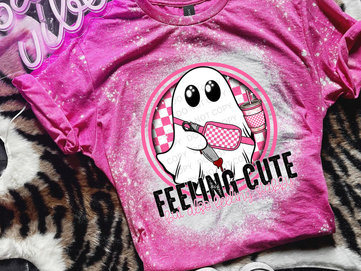 a pink tee shirt with a cartoon character on it
