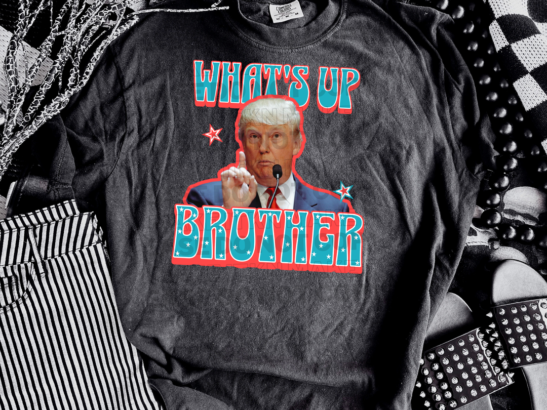 a black t - shirt with a picture of bill clinton on it