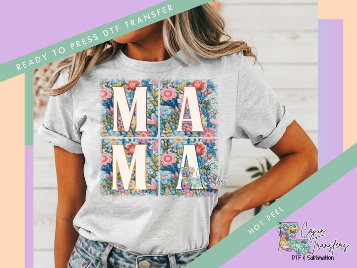 a woman wearing a t - shirt with the words mama printed on it