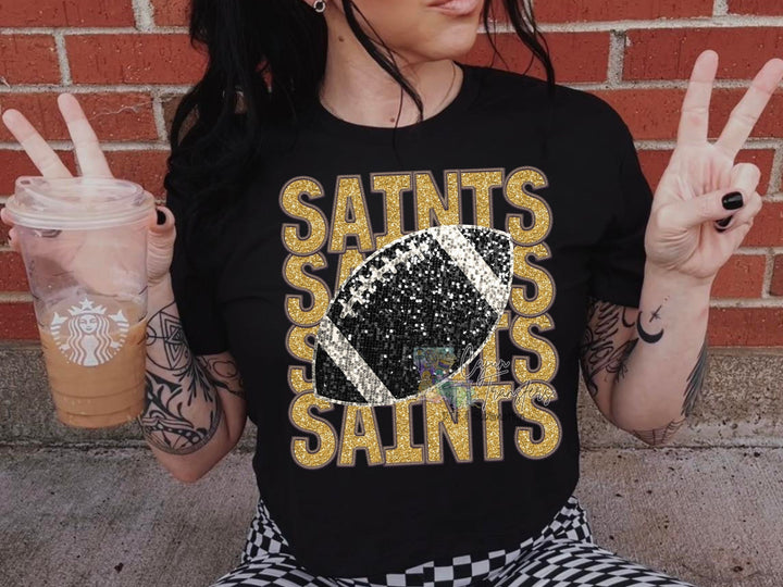 a woman sitting on the ground holding a cup of coffee