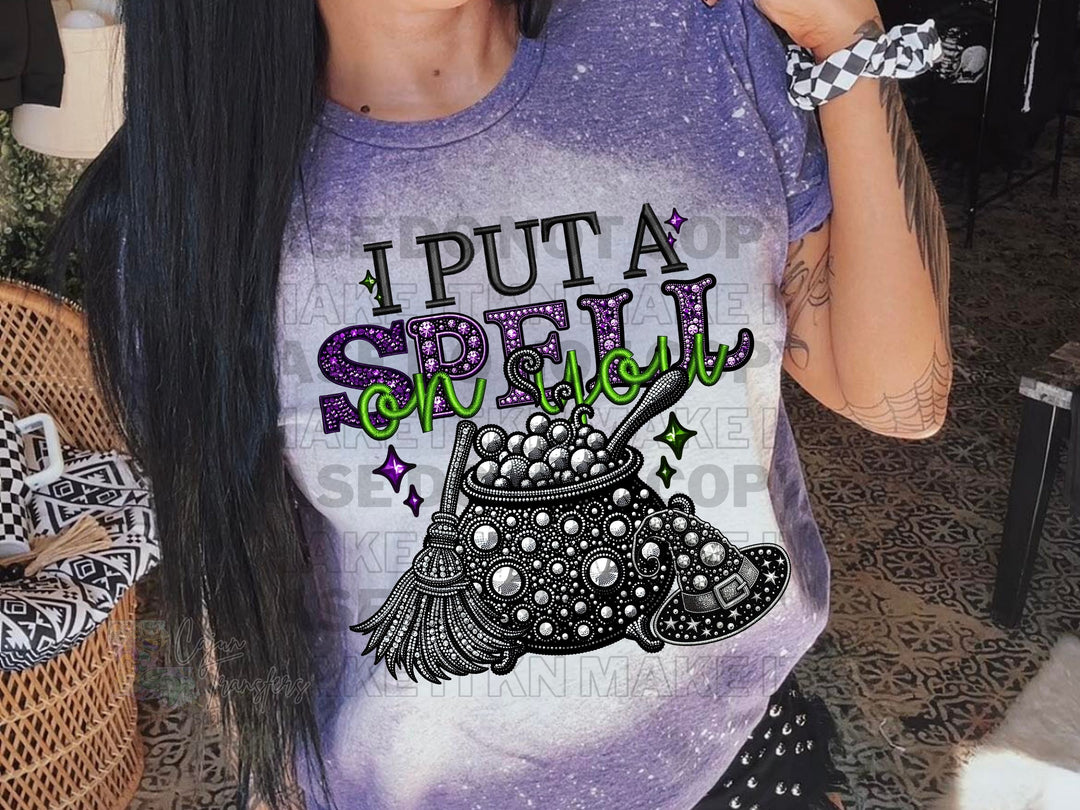 a woman with long black hair wearing a purple shirt
