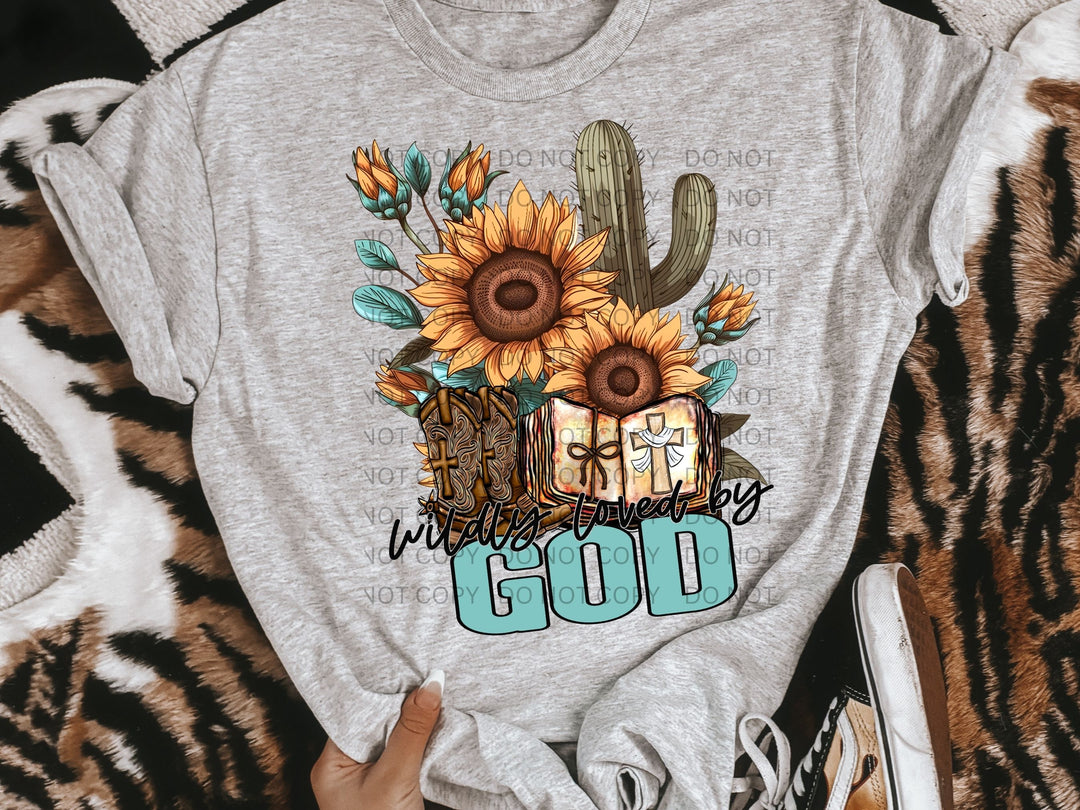 a women's t - shirt with a sunflower and cactus on it