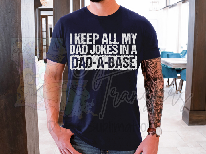 a man wearing a t - shirt that says i keep all my dad jokes in