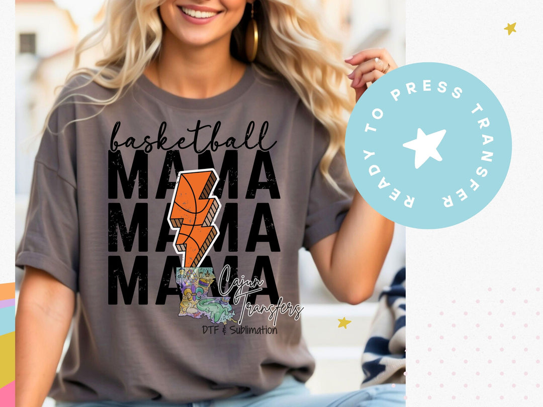 a woman wearing a basketball mama mama mama shirt