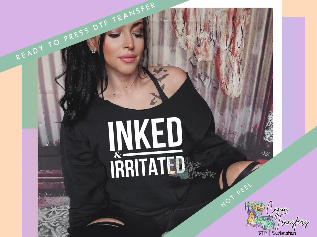 a woman wearing a black shirt that says inked and irritated