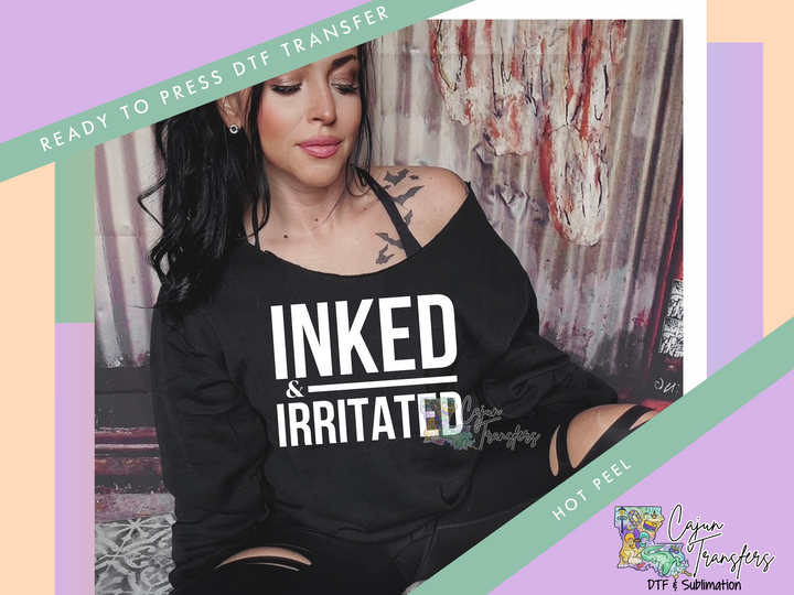a woman wearing a black shirt that says inked and irritated