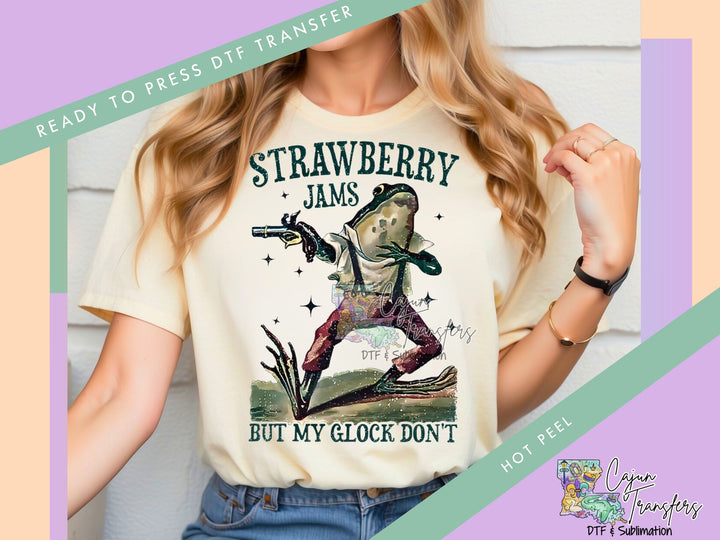 a woman wearing a t - shirt that says strawberry jams but my clock don