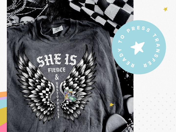 a t - shirt with wings and the words she is fierce on it