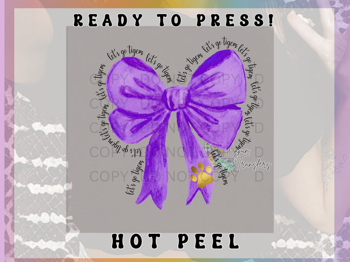 a picture of a purple bow with words reading ready to press