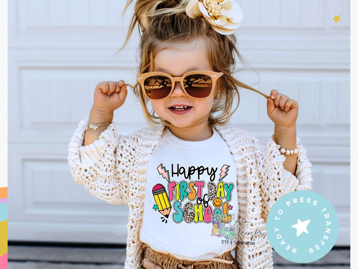 a little girl wearing sunglasses and a happy birthday t - shirt