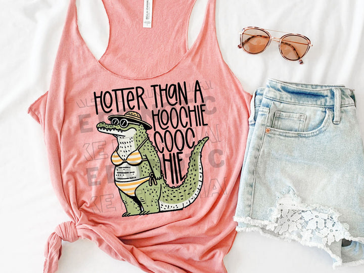 a women's tank top with a graphic of a crocodile