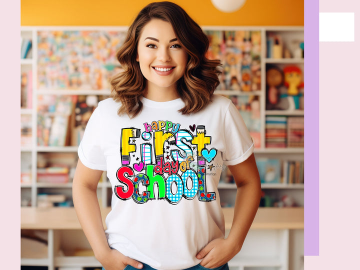 a woman wearing a t - shirt that says first first school