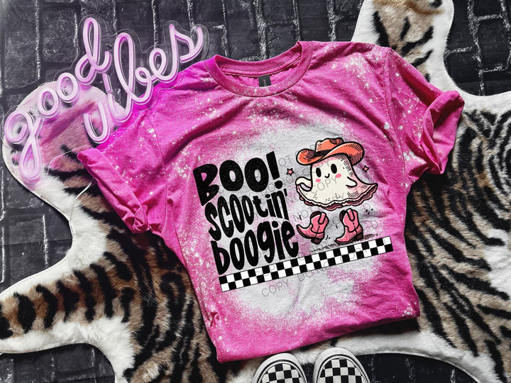 a pink shirt with a cartoon character on it