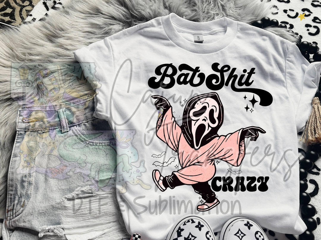 a white shirt with a cartoon character on it