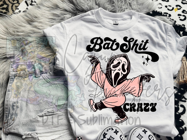 a white shirt with a cartoon character on it