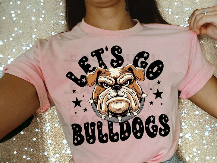 a woman wearing a pink tshirt with a bulldog on it