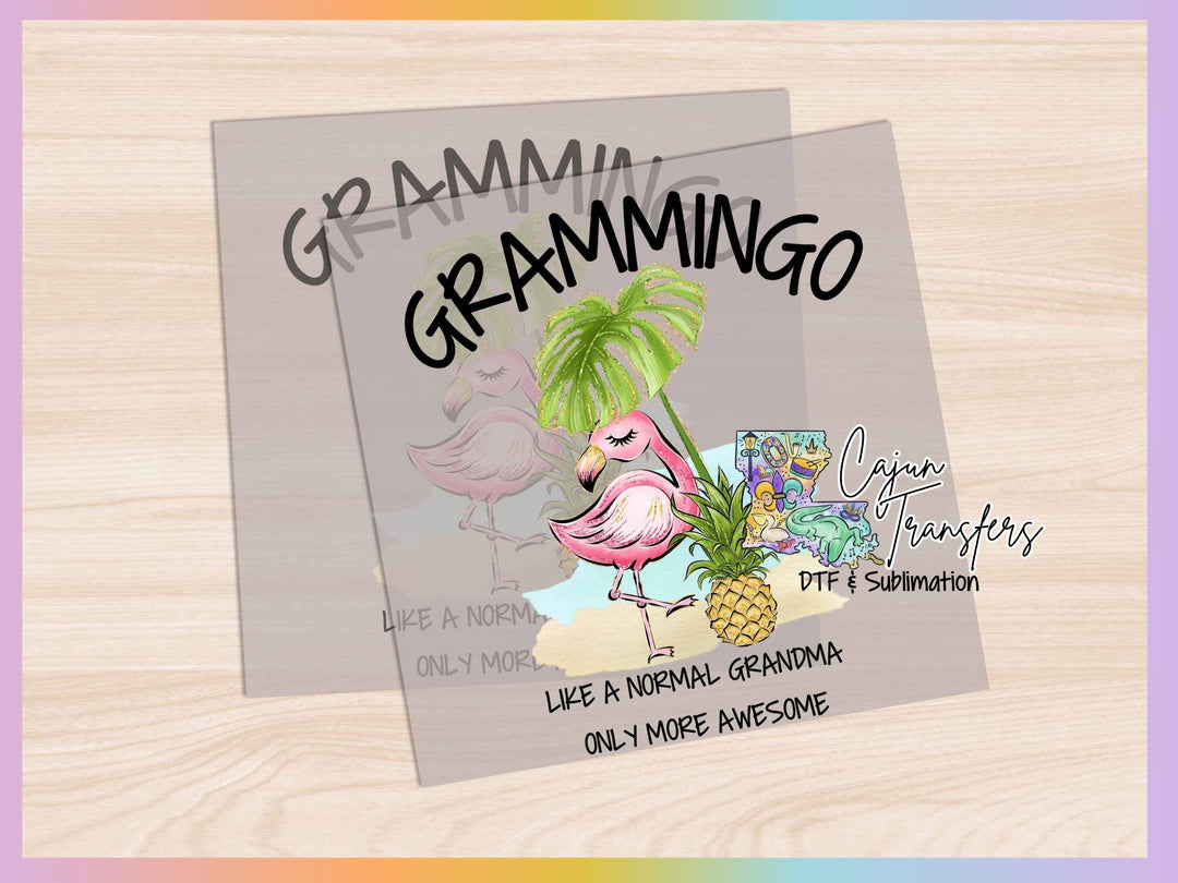 a card with a picture of a flamingo and a pineapple