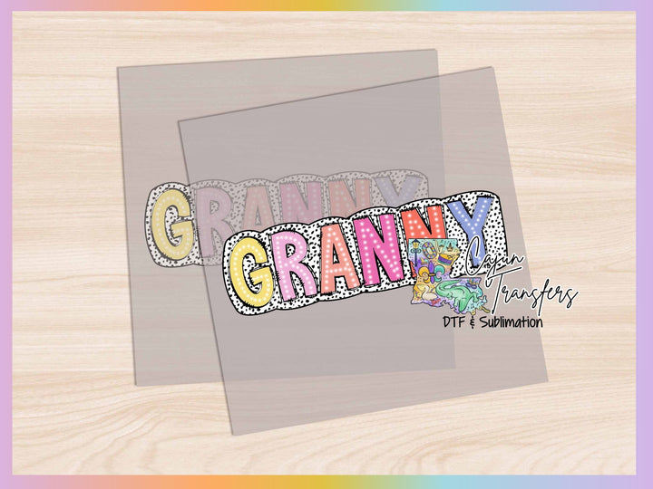a picture of the word granny granny on a wooden background