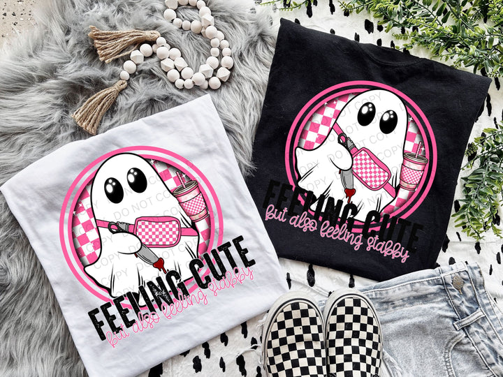 a pair of t - shirts with a dog wearing a bow tie