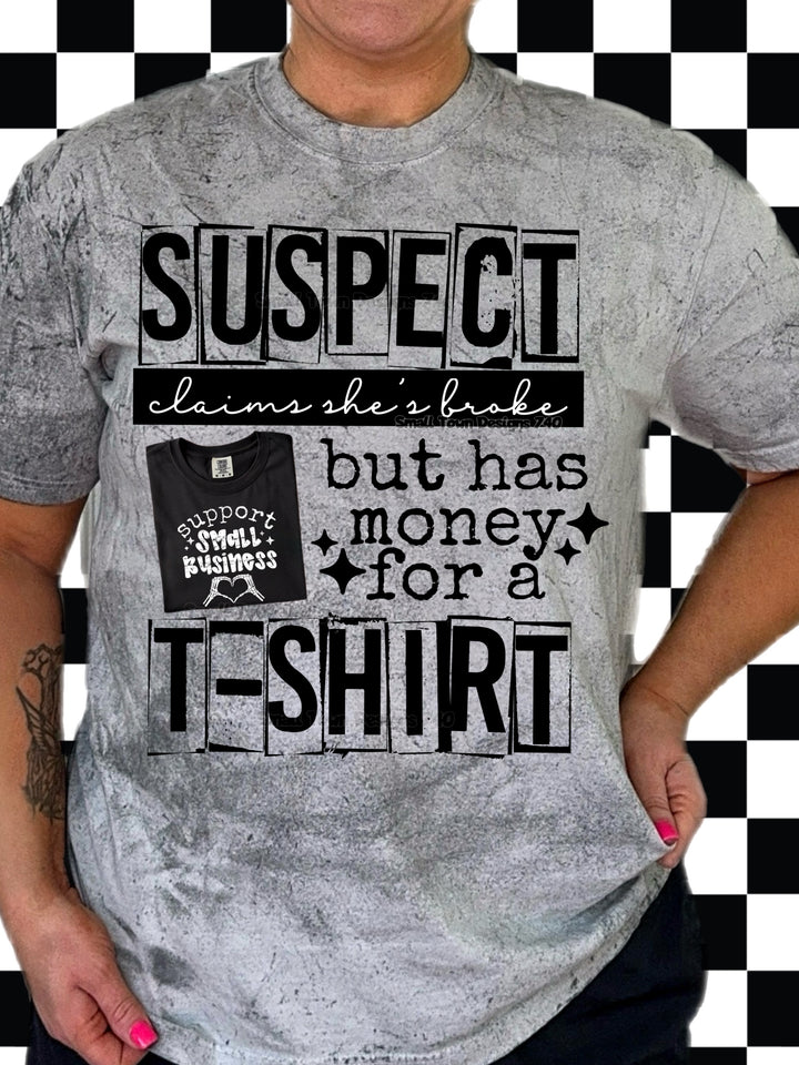 Suspect Claims She's Broke but has Money for a T-Shirt