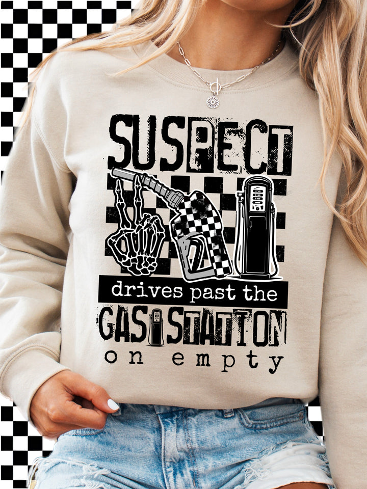 Suspect Drives past the Gas Station