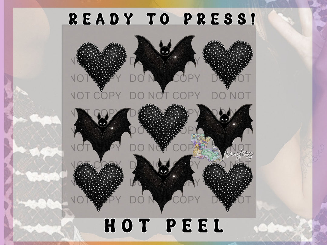 a picture of a bat with hearts on it