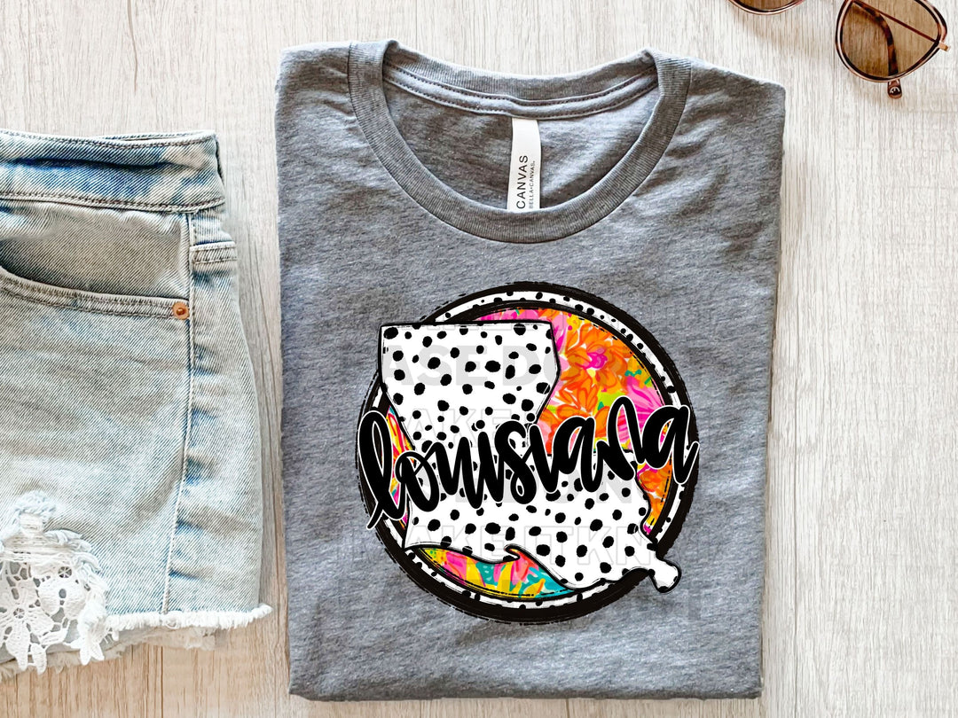 a pair of shorts and a t - shirt on a table