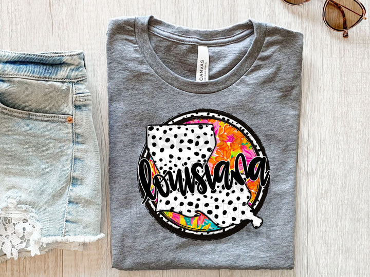 a pair of shorts and a t - shirt on a table