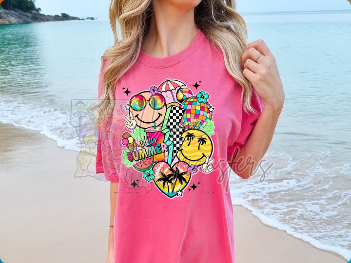 a woman standing on a beach wearing a pink shirt