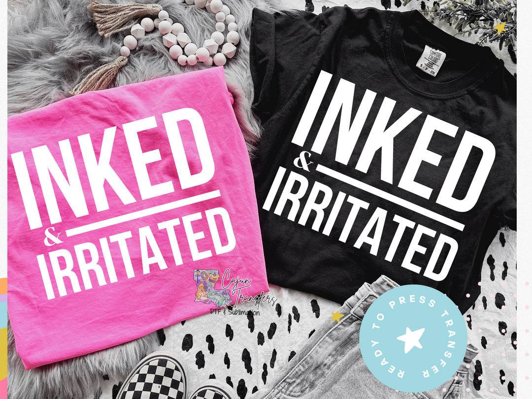 a couple of shirts that are on a bed