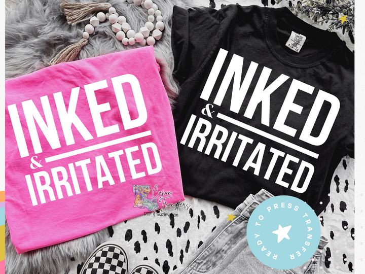 a couple of shirts that are on a bed